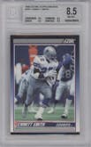 Emmitt Smith from the 1990 Score set graded by Beckett and given an overall grade of 8.5.