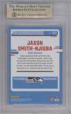 Jaxon Smith-Njigba from the 2023 Donruss Optic set featuring a Red Mojo  parallel graded by Beckett and given an overall grade of 10.