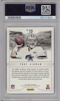 Troy Aikman from the 2013 Panini Prizm set featuring a Walmart Blue parallel graded by PSA and given an overall grade of 8.