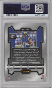Puka Nacua from the 2023 Panini Prizm set featuring a Lazer parallel graded by PSA and given an overall grade of 9.