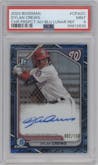 Dylan Crews from the 2024 Bowman set featuring a Blue Lunar Refractor parallel graded by PSA and given an overall grade of 9.