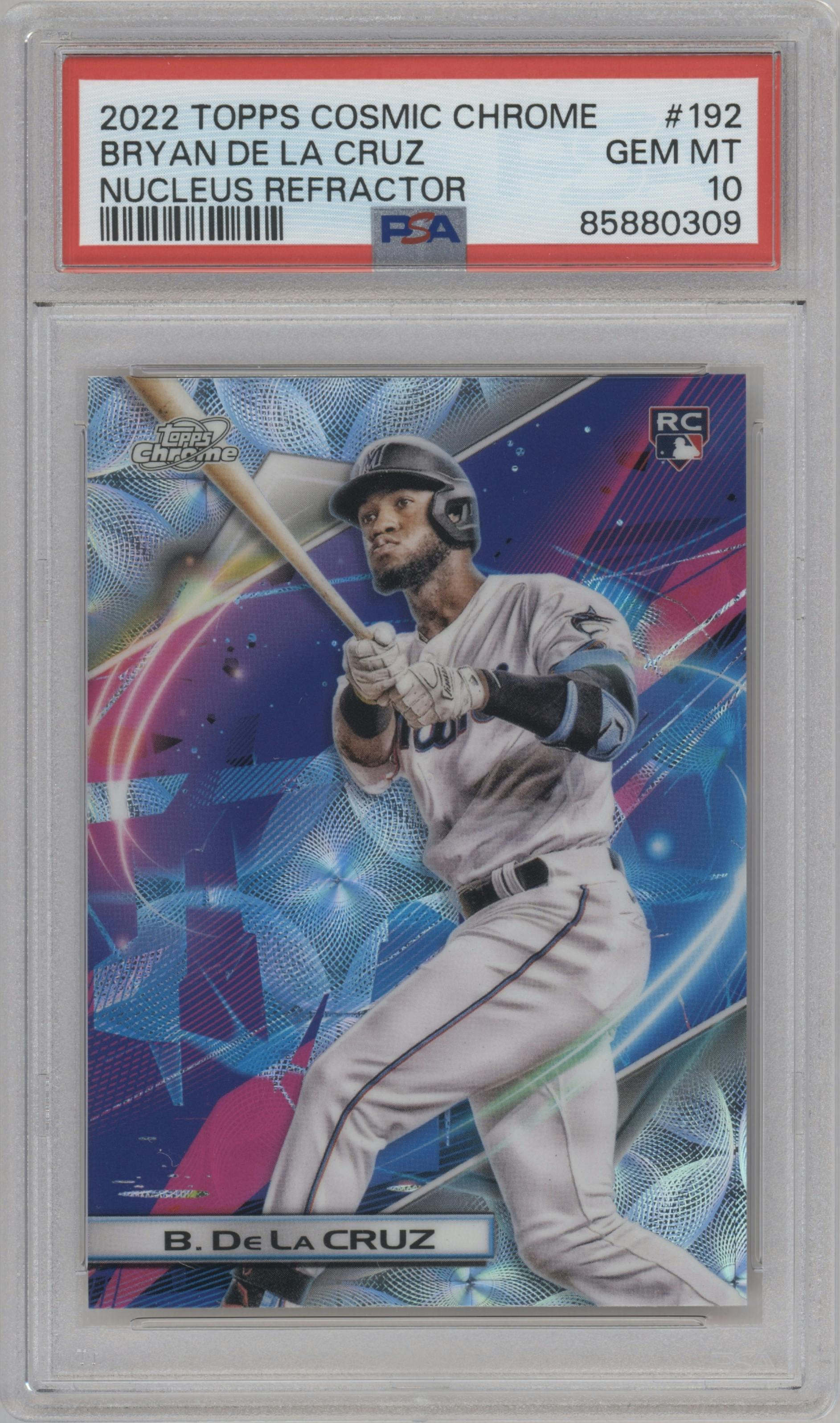 Bryan De La Cruz from the 2022 Topps Cosmic Chrome set featuring a  Nucleus Refractor parallel graded by PSA and given an overall grade of 10.