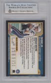 Tom Brady from the 2000 Bowman set graded by Beckett and given an overall grade of 7.