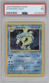 Gyarados from the 1999 Pokemon set graded by PSA and given an overall grade of 7.