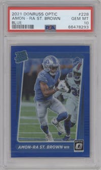 Amon-Ra St. Brown from the 2021 Panini Donruss Optic set featuring a Blue  parallel graded by PSA and given an overall grade of 10.