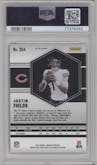 Justin Fields from the 2021 Panini Mosaic set featuring a Silver parallel graded by PSA and given an overall grade of 10.