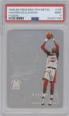 Hakeem Olajuwon from the 1998-99 SkyBox Molten Metal set graded by PSA and given an overall grade of 9.