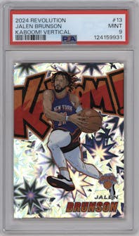 Jalen Brunson from the 2024-25 Panini Revolution set graded by PSA and given an overall grade of 9.