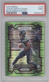 Jaxon Smith-Njigba from the 2023 Panini Prizm set featuring a Neon Green Pulsar parallel graded by PSA and given an overall grade of 9.