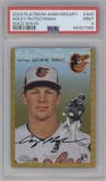 Adley Rutschman from the 2023 Topps Chrome Platinum Anniversary set featuring a Gold Wave Refractor parallel graded by PSA and given an overall grade of 9.