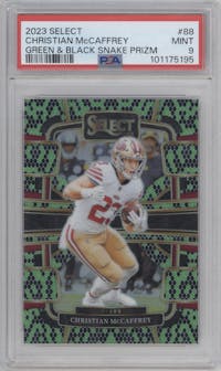 Christian McCaffrey from the 2023 Panini Select set featuring a Green and Black Snakeskin parallel graded by PSA and given an overall grade of 9.