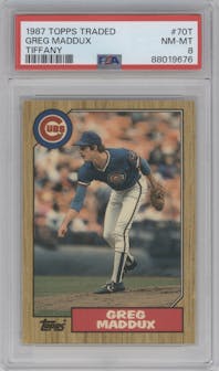 Greg Maddux from the 1987 Topps Traded set featuring a Tiffany parallel graded by PSA and given an overall grade of 8.