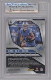 Amon-Ra St. Brown  from the 2024 Panini Prizm set featuring a Gold Vinyl parallel graded by Beckett and given an overall grade of 9.