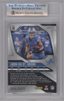 Amon-Ra St. Brown  from the 2024 Panini Prizm set featuring a Gold Vinyl parallel graded by Beckett and given an overall grade of 9.