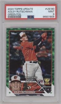 Adley Rutschman from the 2023 Topps Update set featuring a Green Foil parallel graded by PSA and given an overall grade of 9.
