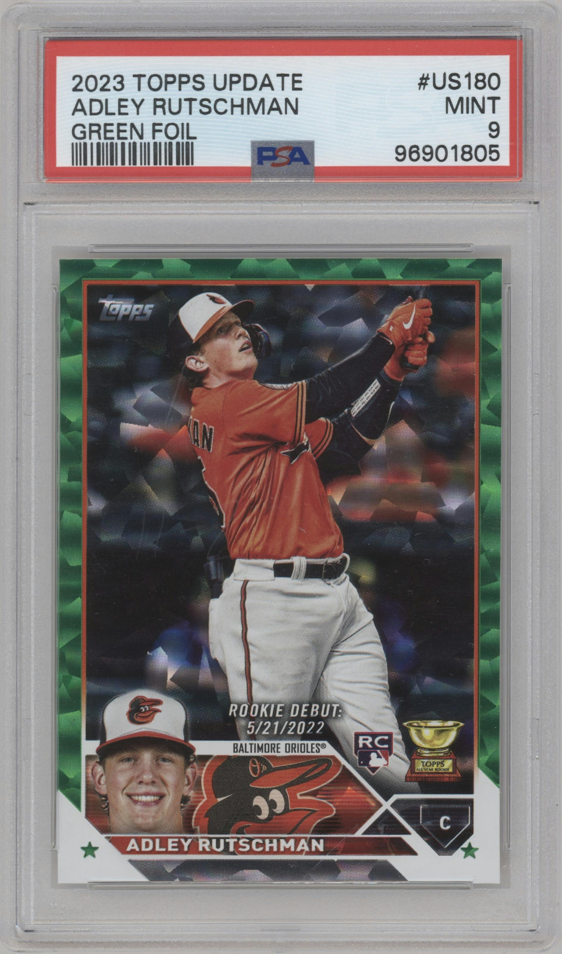 Adley Rutschman from the 2023 Topps Update set featuring a Green Foil parallel graded by PSA and given an overall grade of 9.