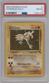 Hitmonlee from the 1999 Pokemon set graded by PSA and given an overall grade of 8.