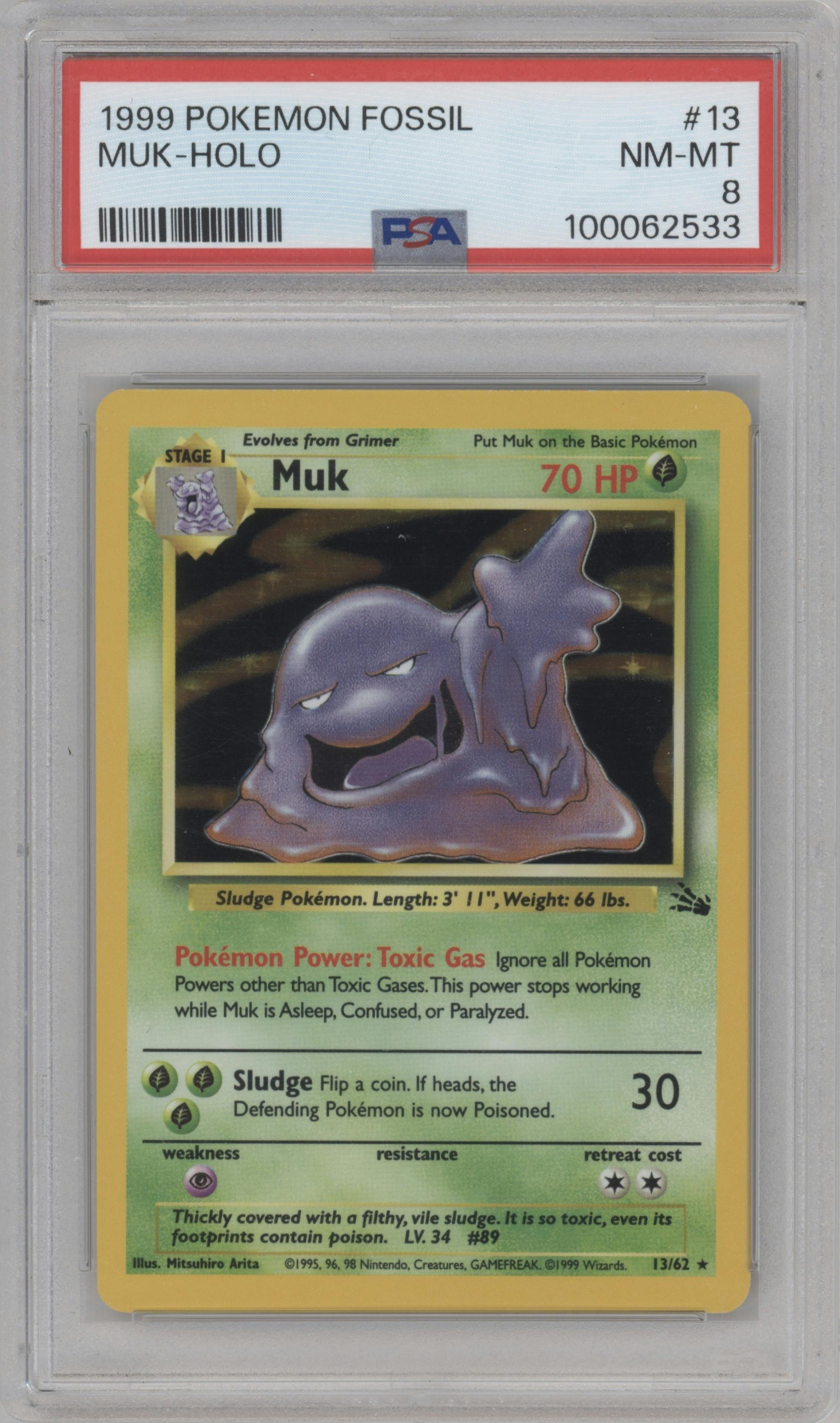 Muk from the 1999 Pokemon set graded by PSA and given an overall grade of 8.