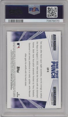 Alek Manoah/Kevin Gausman from the 2023 Topps Series 1 set featuring a Platinum parallel graded by PSA and given an overall grade of 10.