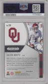 Jalen Hurts from the 2020 Panini Prizm Draft Picks set featuring a Red Prizm parallel graded by PSA and given an overall grade of 9.