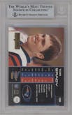 Tom Brady from the 2000 Pacific Prism Prospect set graded by Beckett and given an overall grade of 8.5.