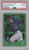 Nolan Arenado from the 2013 Topps Update set featuring a Emerald Foil  parallel graded by PSA and given an overall grade of 9.