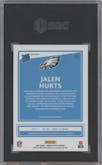 Jalen Hurts from the 2020 Panini Donruss Optic set featuring a Holo parallel graded by SGC and given an overall grade of 10.