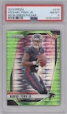 Michael Penix Jr. from the 2024 Panini Prizm set featuring a Neon Green Pulsar  parallel graded by PSA and given an overall grade of 8.