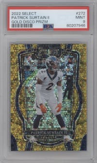 Patrick Surtain II from the 2022 Panini Select set featuring a Gold Disco parallel graded by PSA and given an overall grade of 9.