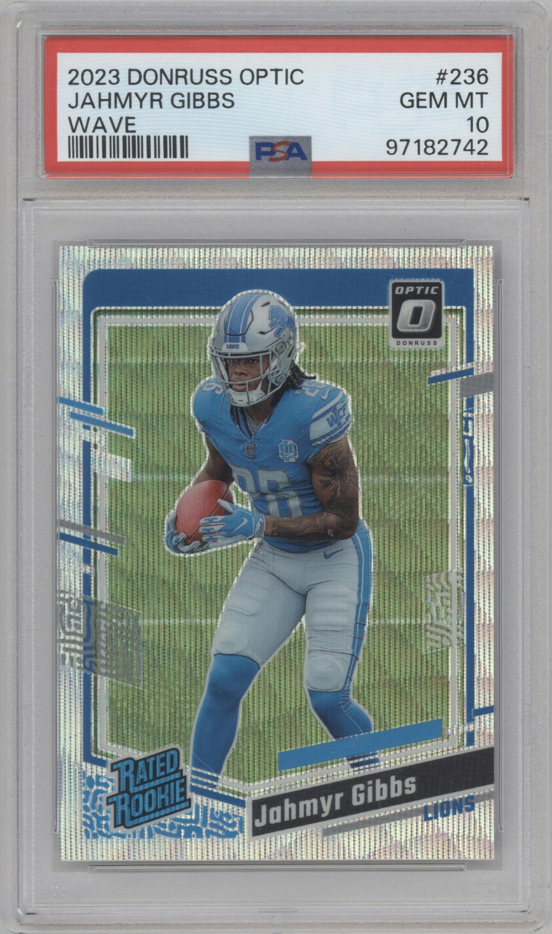 Jahmyr Gibbs from the 2023 Donruss Optic set featuring a Wave parallel graded by PSA and given an overall grade of 10.