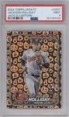 Jackson Holliday from the 2024 Topps Update set featuring a Holiday Jack O'Lanterns parallel graded by PSA and given an overall grade of 9.