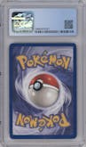 Rocket's Sneak Attack from the 2000 Pokemon set graded by CSG and given an overall grade of 8.