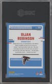 Bijan Robinson from the 2023 Donruss Optic set featuring a Pink parallel graded by SGC and given an overall grade of 10.