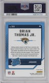 Brian Thomas Jr. from the 2024 Donruss set featuring a Red Pandora parallel graded by PSA and given an overall grade of 10.