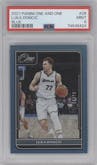 Luka Doncic from the 2021-22 Panini One and One set featuring a Blue parallel graded by PSA and given an overall grade of 9.