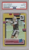 Brock Purdy from the 2022 Panini Donruss set featuring a Press Proof Premium parallel graded by PSA and given an overall grade of 10.