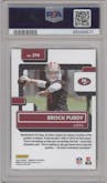 Brock Purdy from the 2022 Panini Donruss set featuring a Press Proof Premium parallel graded by PSA and given an overall grade of 10.