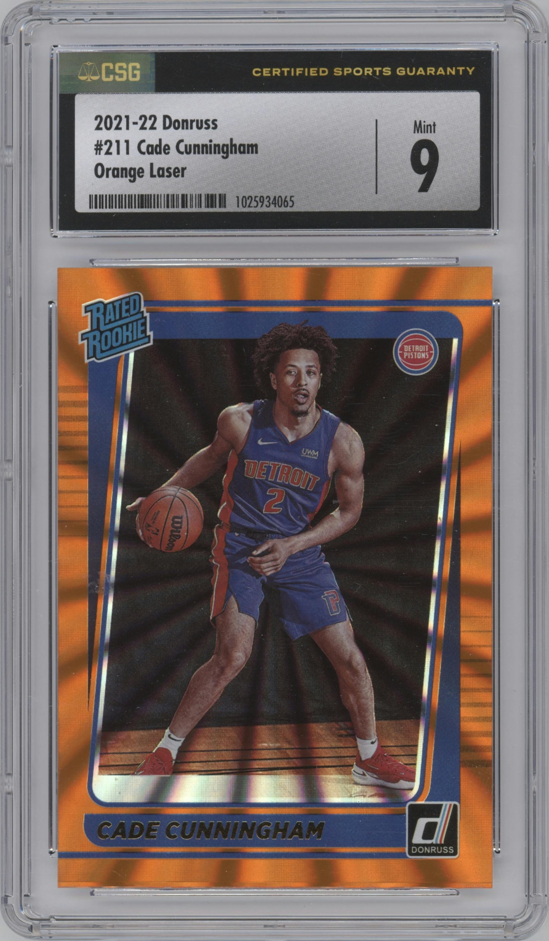 Cade Cunningham from the 2021-22 Panini Donruss set featuring a Orange Holo Laser parallel graded by CSG and given an overall grade of 9.