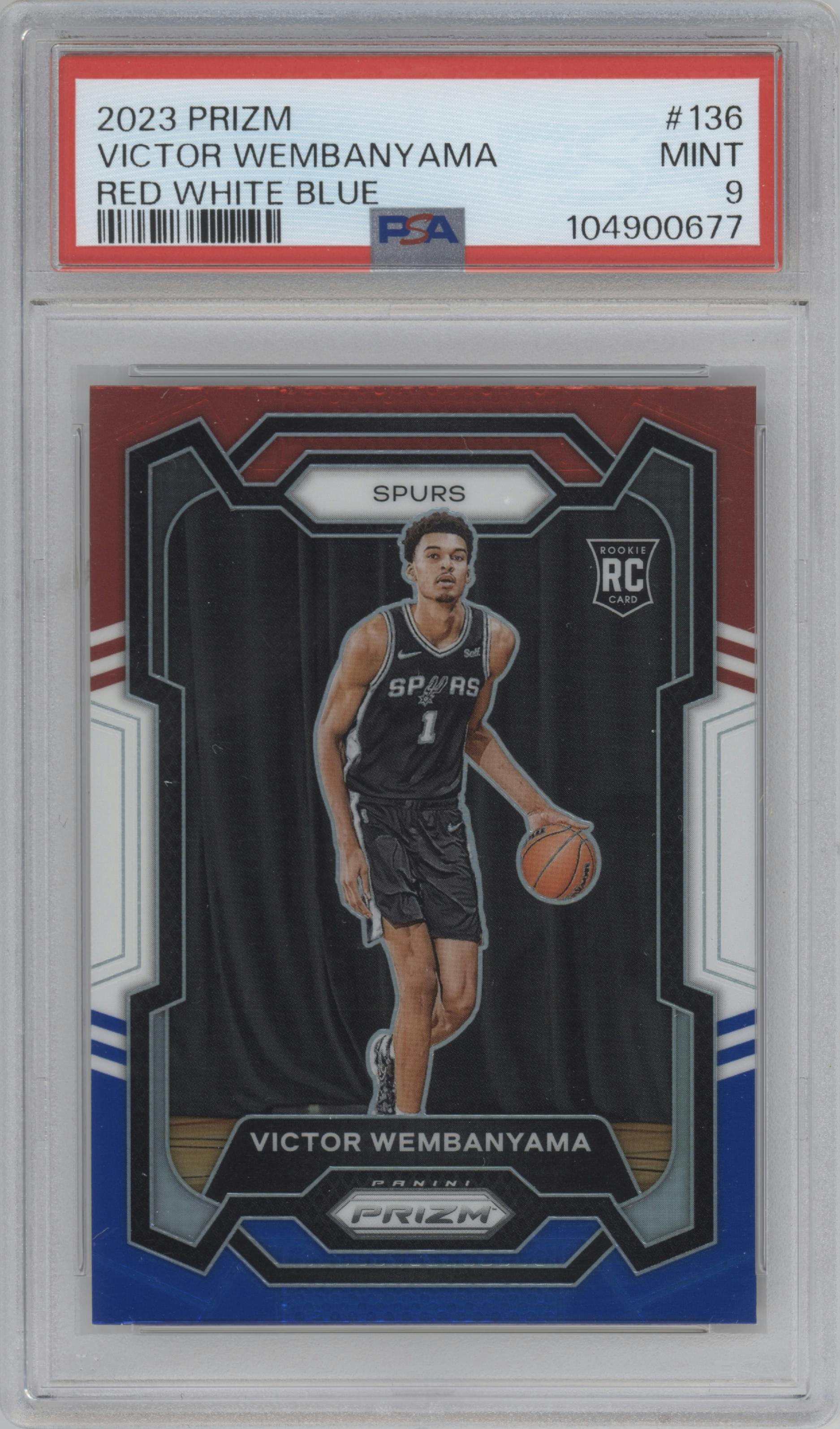 Victor Wembanyama from the 2023-24 Panini Prizm set featuring a Red White Blue Prizm parallel graded by PSA and given an overall grade of 9.
