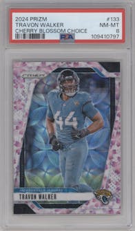 Travon Walker from the 2024 Panini Prizm set featuring a Choice Cherry Blossom Prizm parallel graded by PSA and given an overall grade of 8.