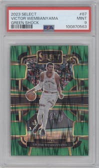 Victor Wembanyama from the 2023-24 Panini Select  set featuring a Green Shock Prizm parallel graded by PSA and given an overall grade of 9.