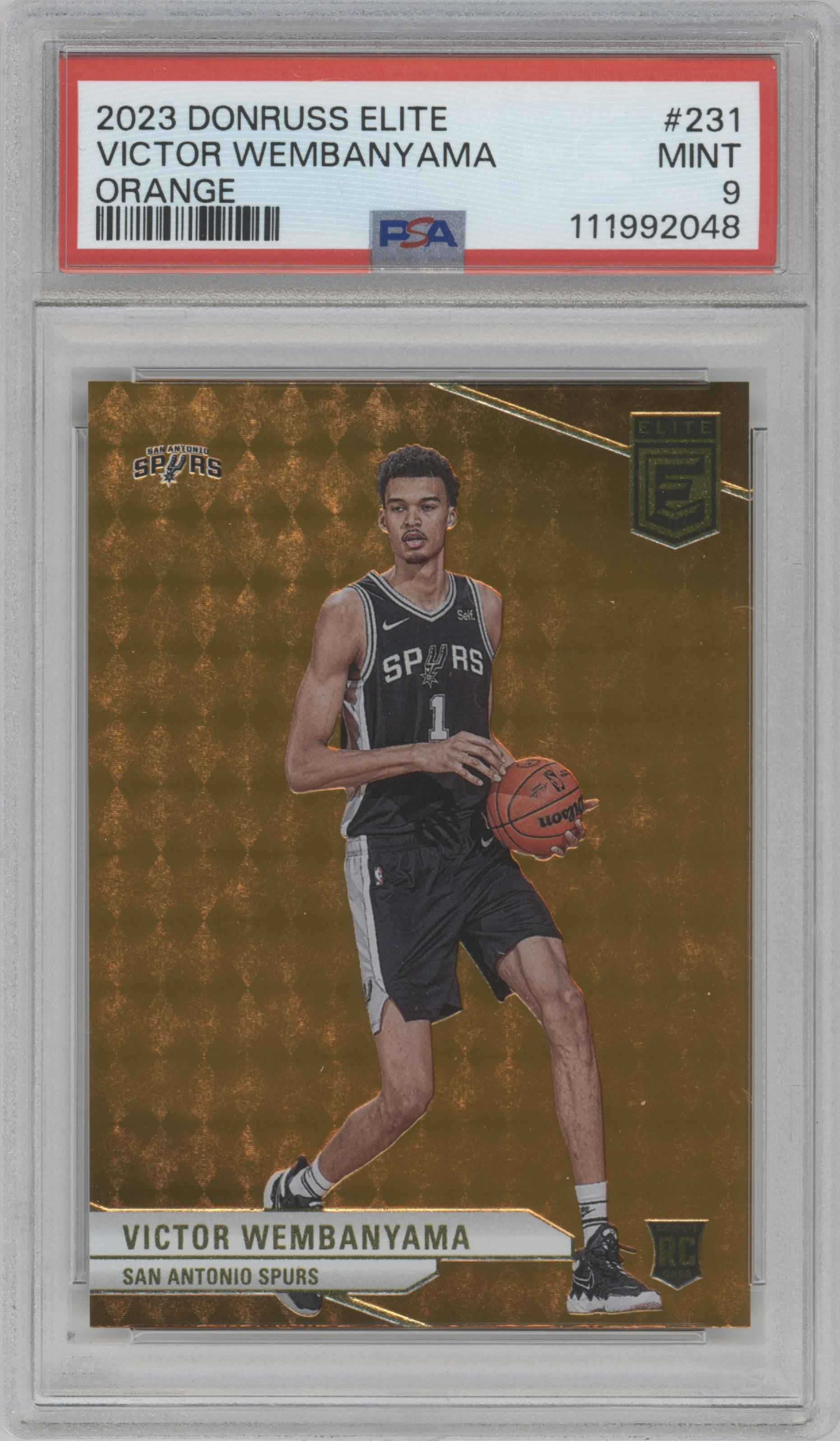 Victor Wembanyama from the 2023-24 Panini Donruss Elite set featuring a Orange parallel graded by PSA and given an overall grade of 9.