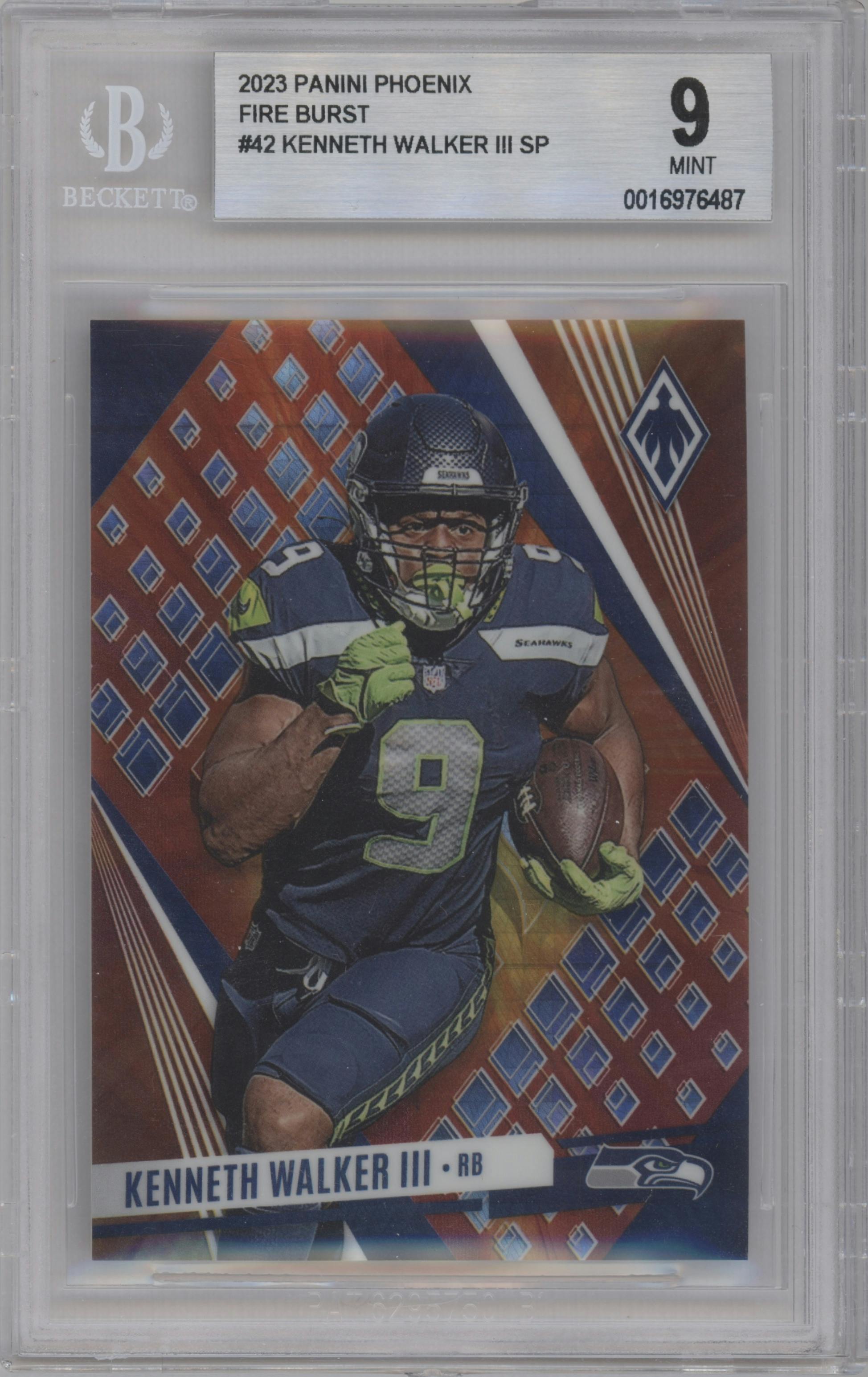 Kenneth Walker III from the 2023 Panini Phoenix set featuring a Fire Burst parallel graded by Beckett and given an overall grade of 9.