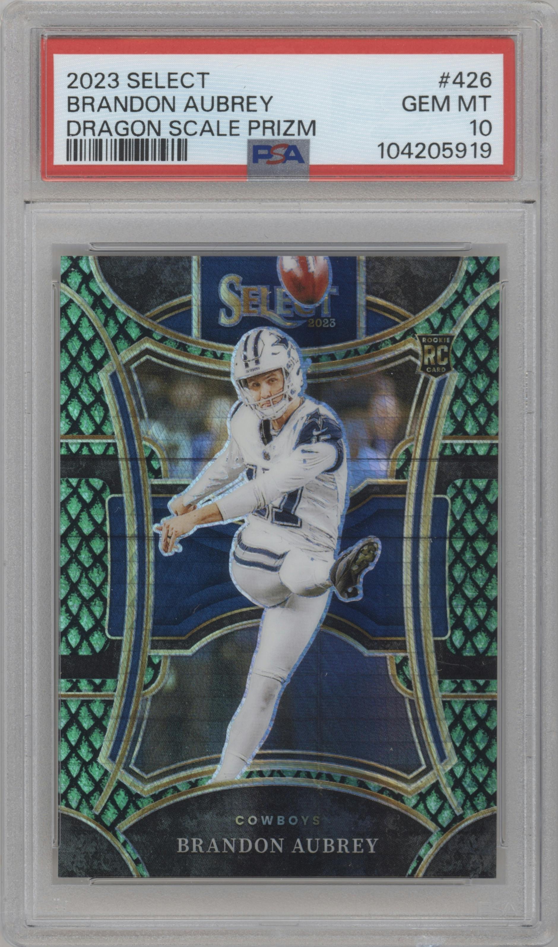 Brandon Aubrey from the 2023 Panini Select set featuring a Dragon Scale parallel graded by PSA and given an overall grade of 10.