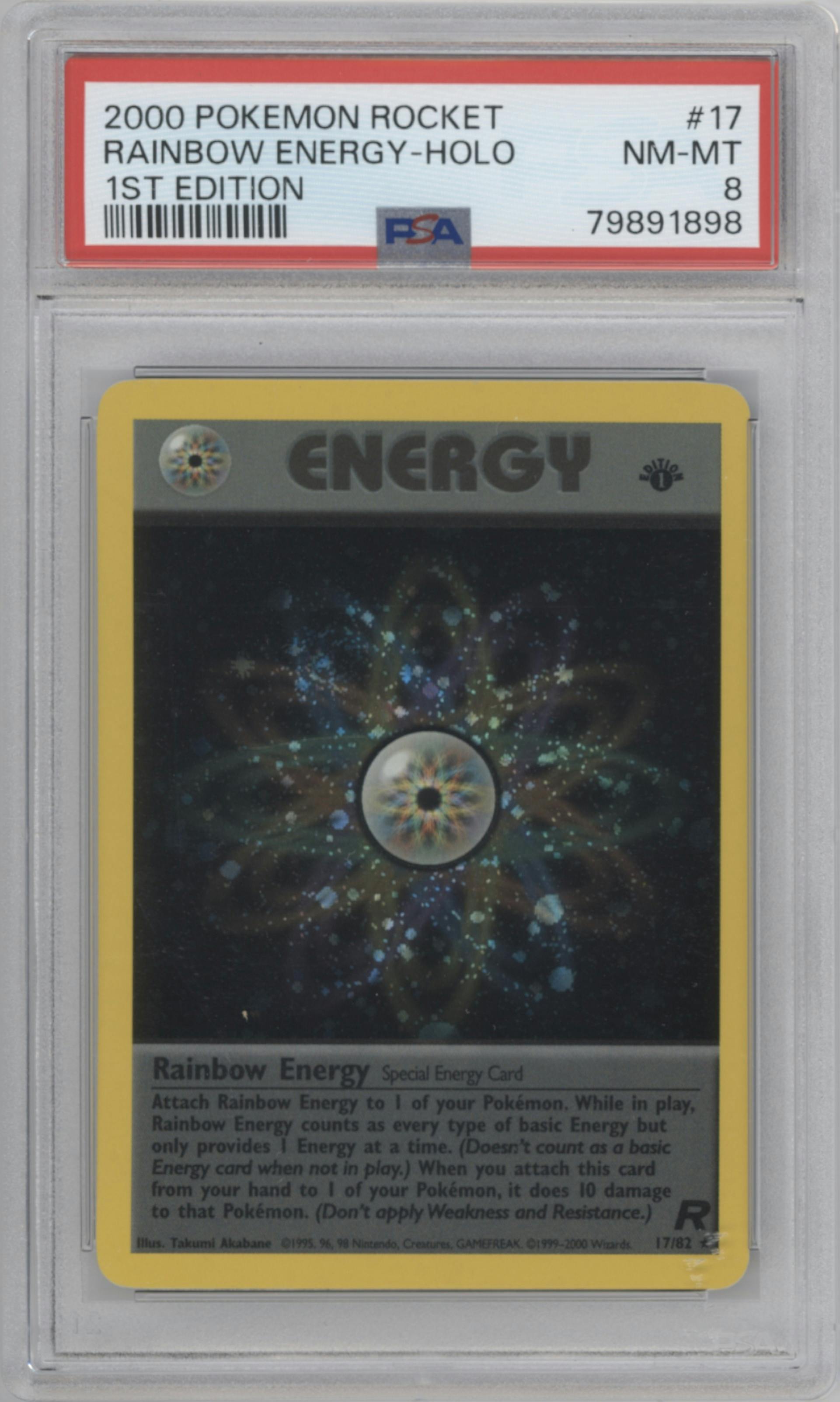 Rainbow Energy from the 2000 Pokemon set graded by PSA and given an overall grade of 8.