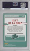 Elly De La Cruz from the 2023 Panini Donruss set featuring a Carolina Blue Holo parallel graded by PSA and given an overall grade of 9.