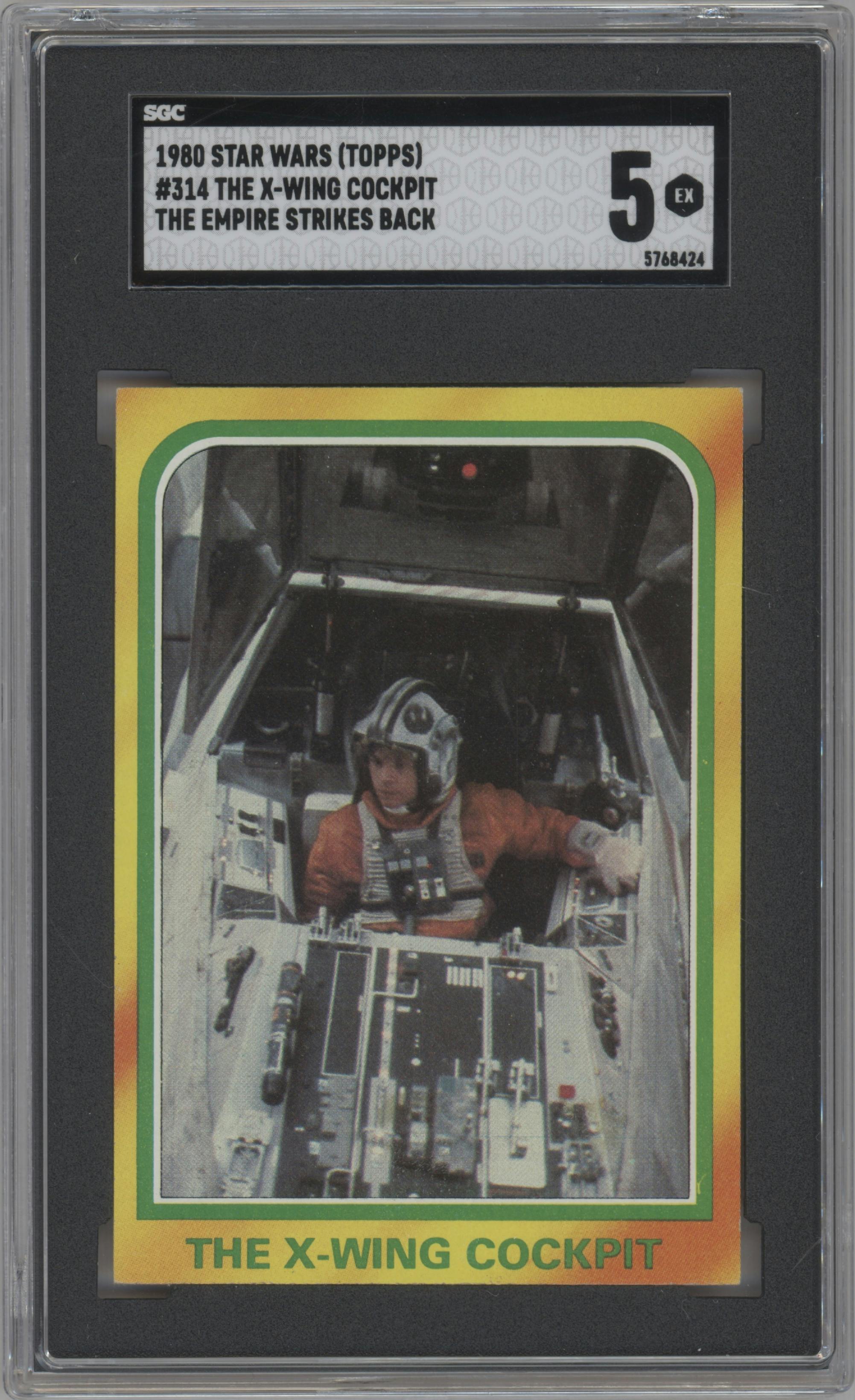 The X-Wing Cockpit from the 1980 Topps Star Wars Empire Strikes Back set graded by SGC and given an overall grade of 5.