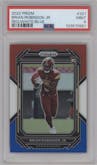 Brian Robinson Jr. from the 2022 Panini Prizm set featuring a Red/White/Blue Prizm parallel graded by PSA and given an overall grade of 9.