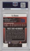 Eli Manning from the 2006 Topps Finest set featuring a Green Refractors parallel graded by PSA and given an overall grade of 10.