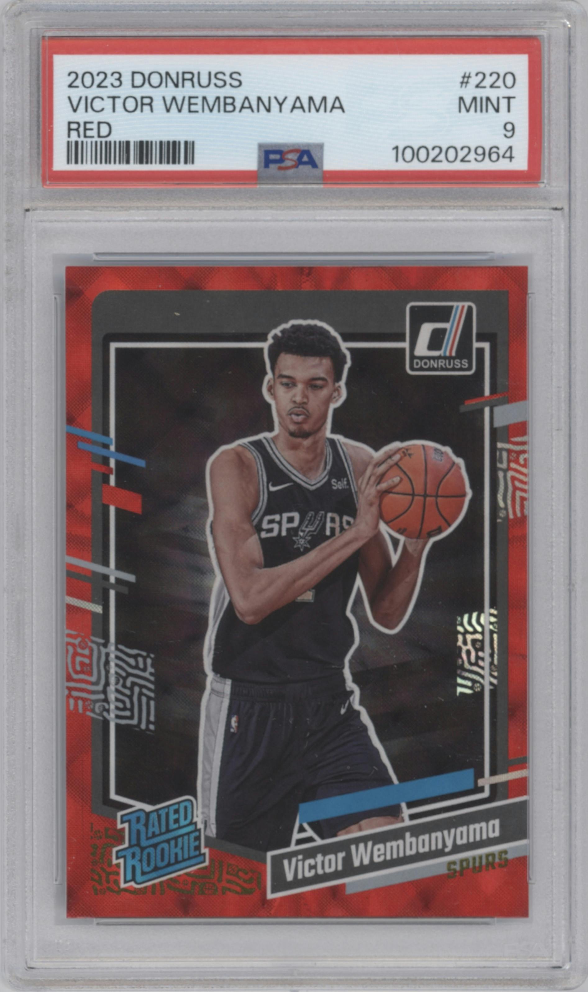 Victor Wembanyama from the 2023-24 Panini Donruss set featuring a Red parallel graded by PSA and given an overall grade of 9.